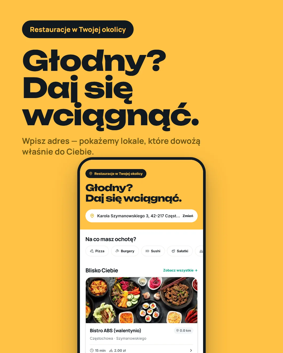 Ekran startowy aplikacji z hasłem „Głodny? Daj się wciągnąć” i polem adresu. Poniżej kategorie — pizza, burgery, sushi, sałatki — oraz lista lokali w pobliżu ze zdjęciem dania, czasem dostawy 15 minut i kosztem dowozu 2 zł.